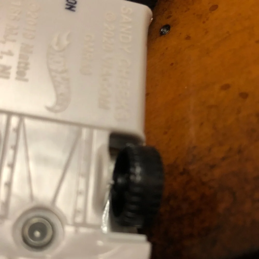 White Mini Convertible Toy Car with Translucent Amber Canopy